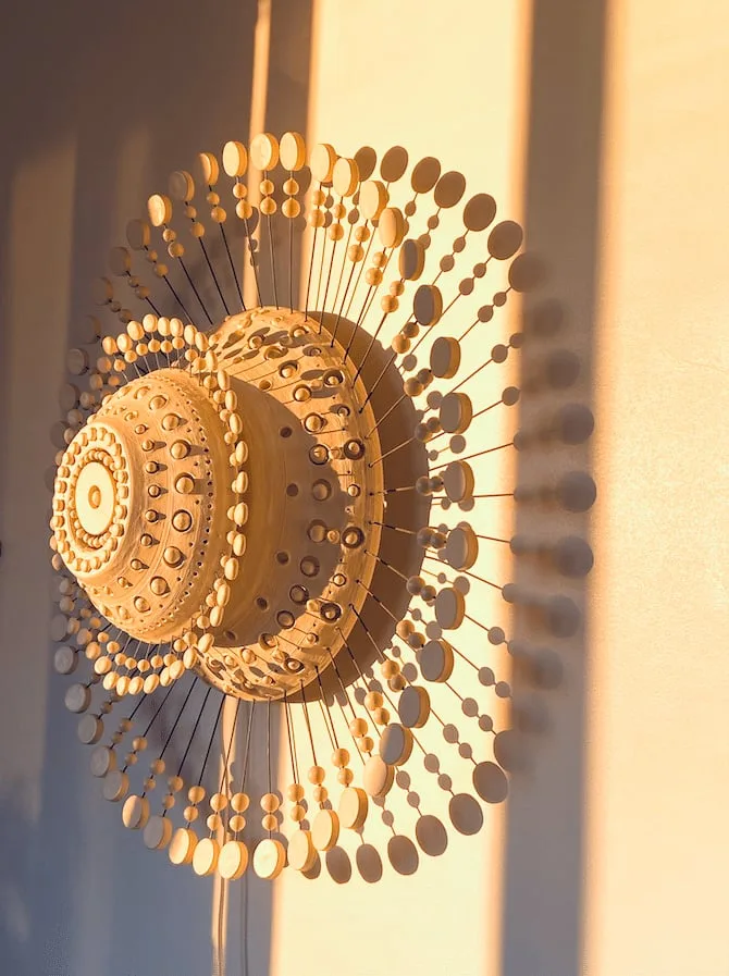 Sun ceramic wall sconce by Georges Pelletier by Georges Pelletier