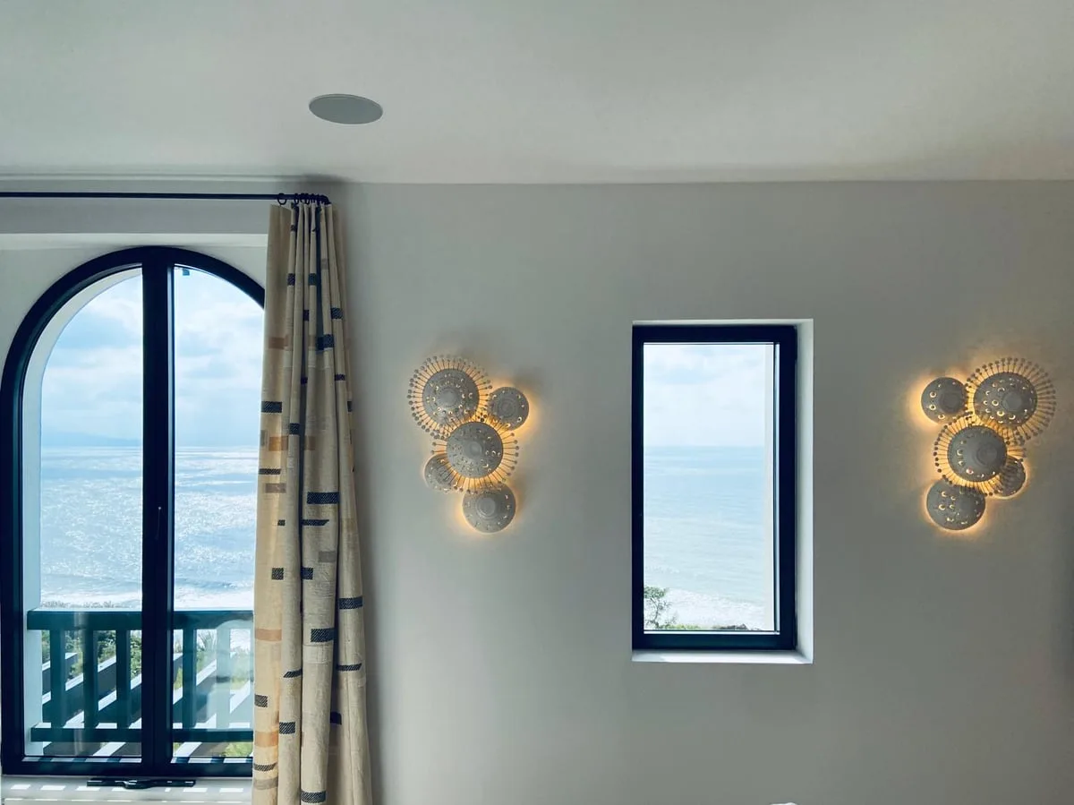 Sunshine wall sconces in glazed white ceramic by Georges Pelletier, View 2