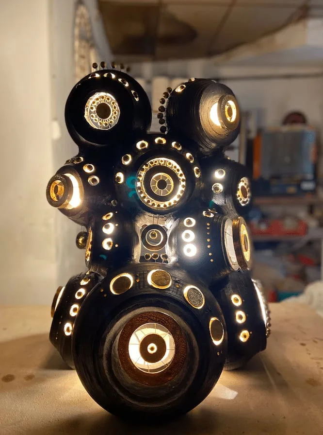 Sculpture lamp by Georges Pelletier in bluish black enamel, gold and platinum