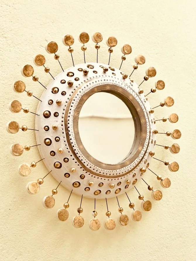 Mirror Soleil, white and gold enameled ceramic by Georges Pelletier