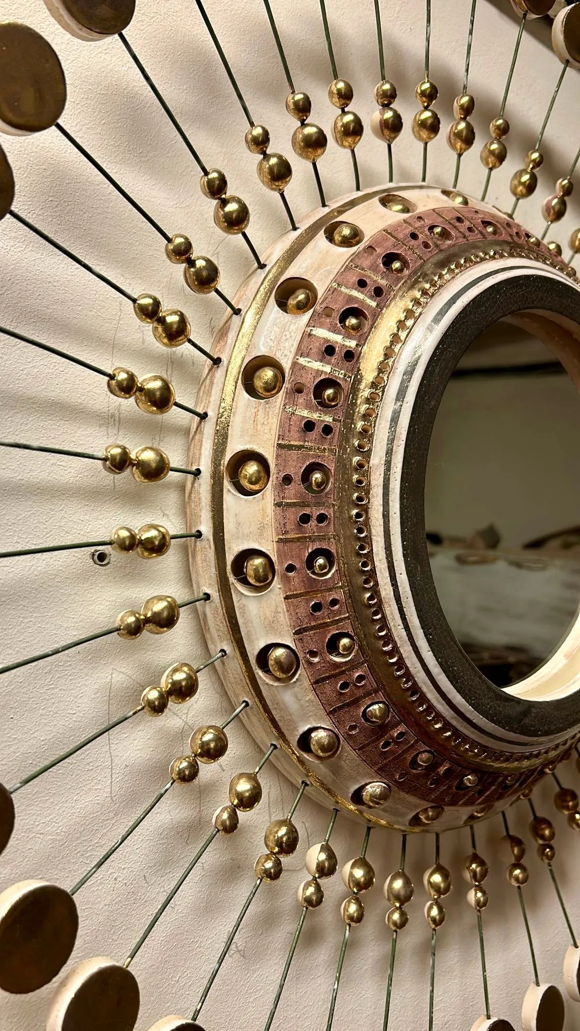 Sun Mirror by Georges Pelletier in white, gold and platinum